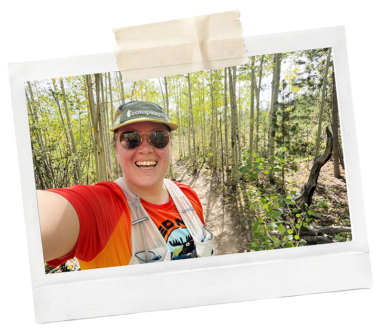 Polaroid of Alex grinning mid trail run among the aspens